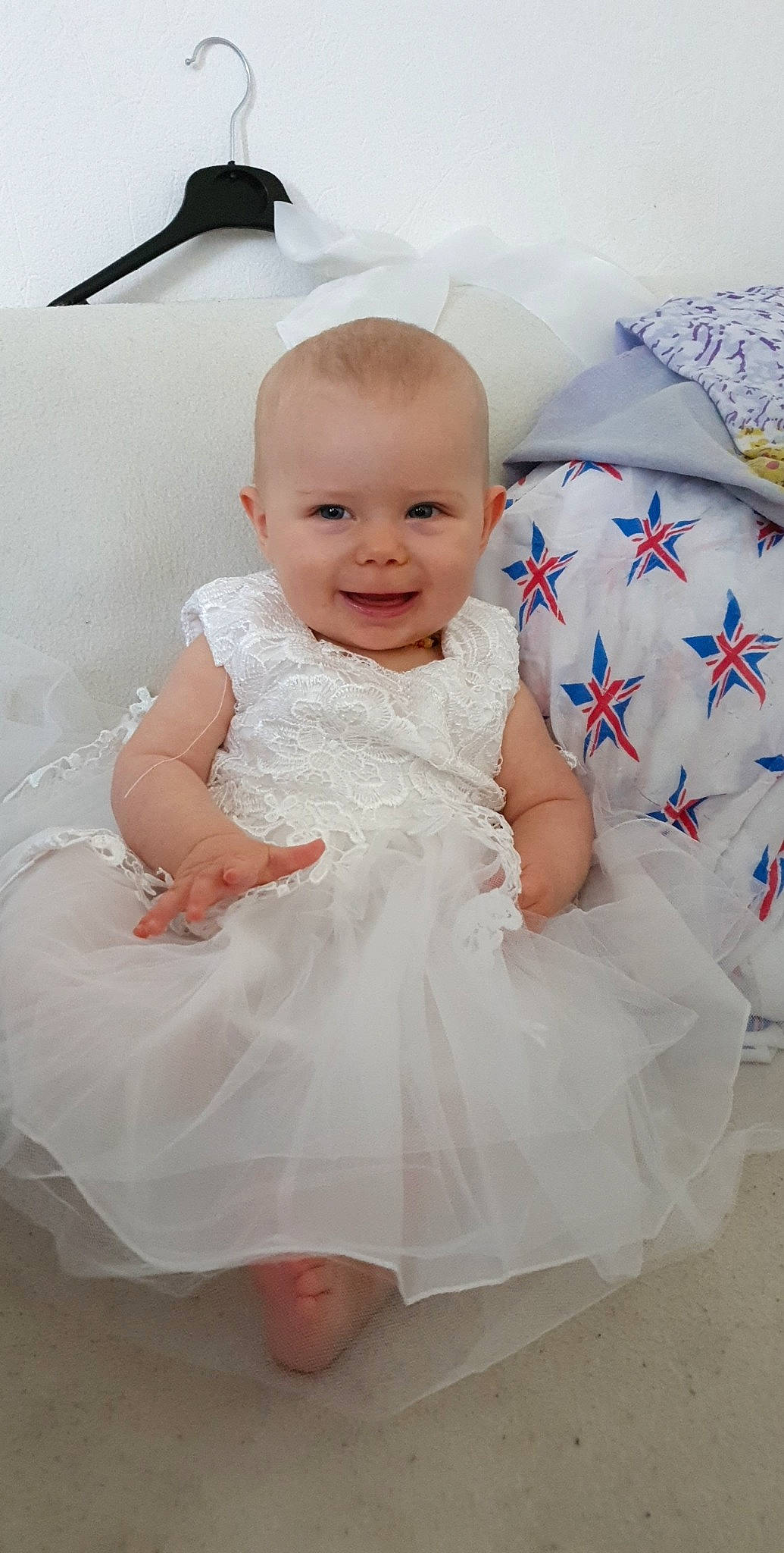 Layanna a rejoint le concours — aidez-le/la à gagner de superbes lots ! baby, baby_toddler_clothing, cheek, child, dress, iris, joy, person, pink, product, room, skin, smile, toddler, white