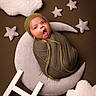 Rihan joined the competition — help win amazing prizes! baby, brown_background, child, clouds, cozy, crescent_moon, cute, green, hat, infant, ladder, newborn, pillow, portrait, sleepy, soft_toys, stars, studio, swaddle, yawning