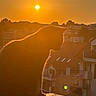 Ruby participe au concours pour gagner de l'argent avec cette photo : animal, backlit, building, cat, evening, feline, glow, ledges, nature, orange, outdoor, peaceful, quiet, roof, shadow, silhouette, sky, sun, sunset, urban
