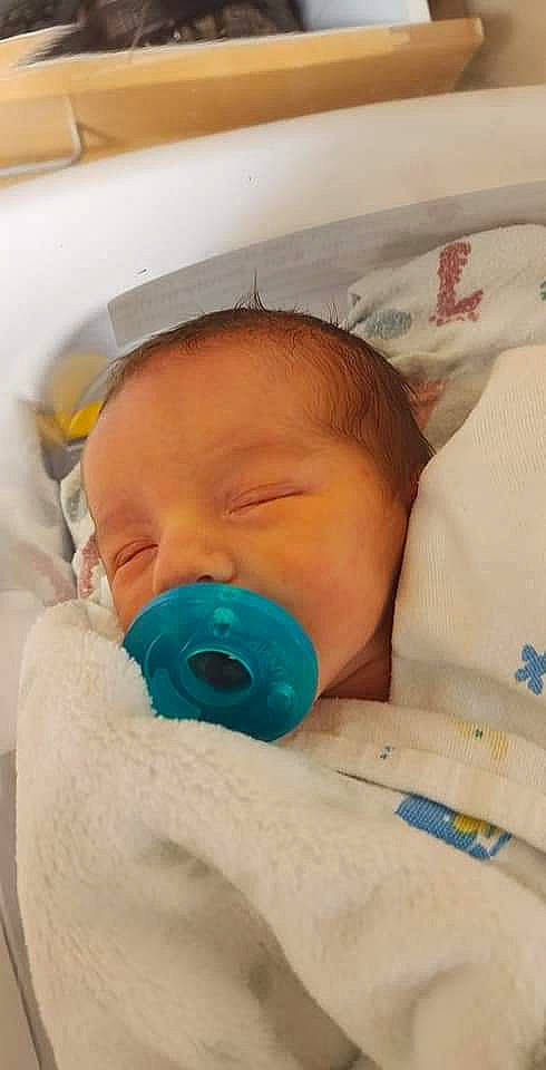 Lincoln is registered to the contest to win money with this photo: baby, baby_products, baby_safety, baby_sleeping, baby_toddler_clothing, bedtime, cheek, child, chin, comfort, eyebrow, linens, nap, nose, person, room, skin, toddler