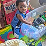 child, children, toys, playtime, indoor, playmat, tent, colorful, bin, plastic, curious, shoes, floor, casual, home, kids_only, keep_out, candid, boys, fun