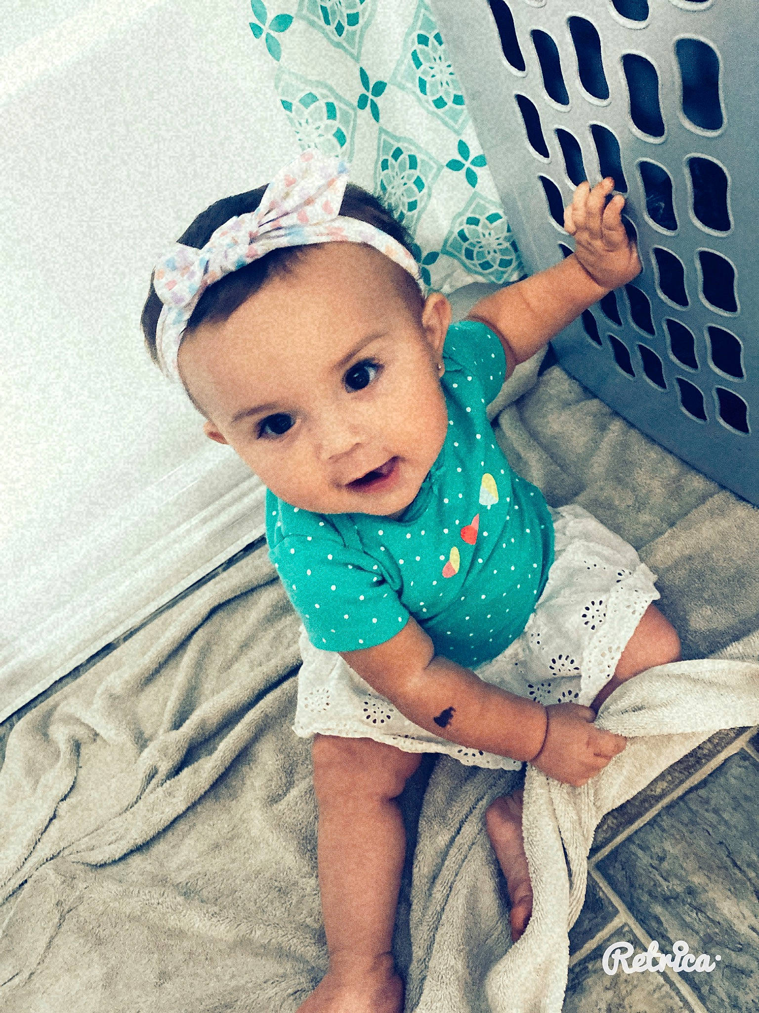 Paula joined the competition — help win amazing prizes! arm, baby, baby_toddler_clothing, cap, child, electric_blue, eye, face, fashion_accessory, hand, happy, human_leg, linens, pattern, person, sitting, sleeve, t_shirt, thigh, toddler