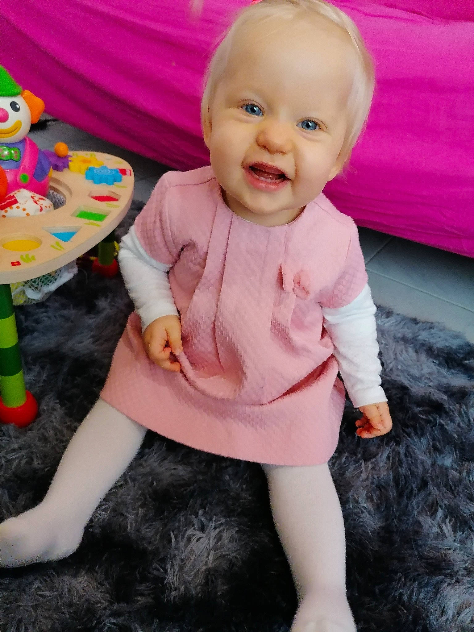 Eléonor a rejoint le concours — aidez-le/la à gagner de superbes lots ! baby, baby_toddler_clothing, cheek, child, dress, facial_expression, fun, happy, human_body, person, photograph, pink, product, purple, shorts, skin, sleeve, smile, standing, t_shirt