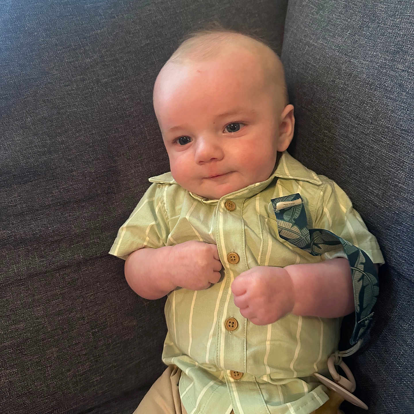 Sheperd joined the competition — help win amazing prizes! baby, child, infant, couch, clothing, shirt, shorts, pacifier, face, smile, sitting, indoor, furniture, cute, expression, young, person, relaxing, comfort, portrait