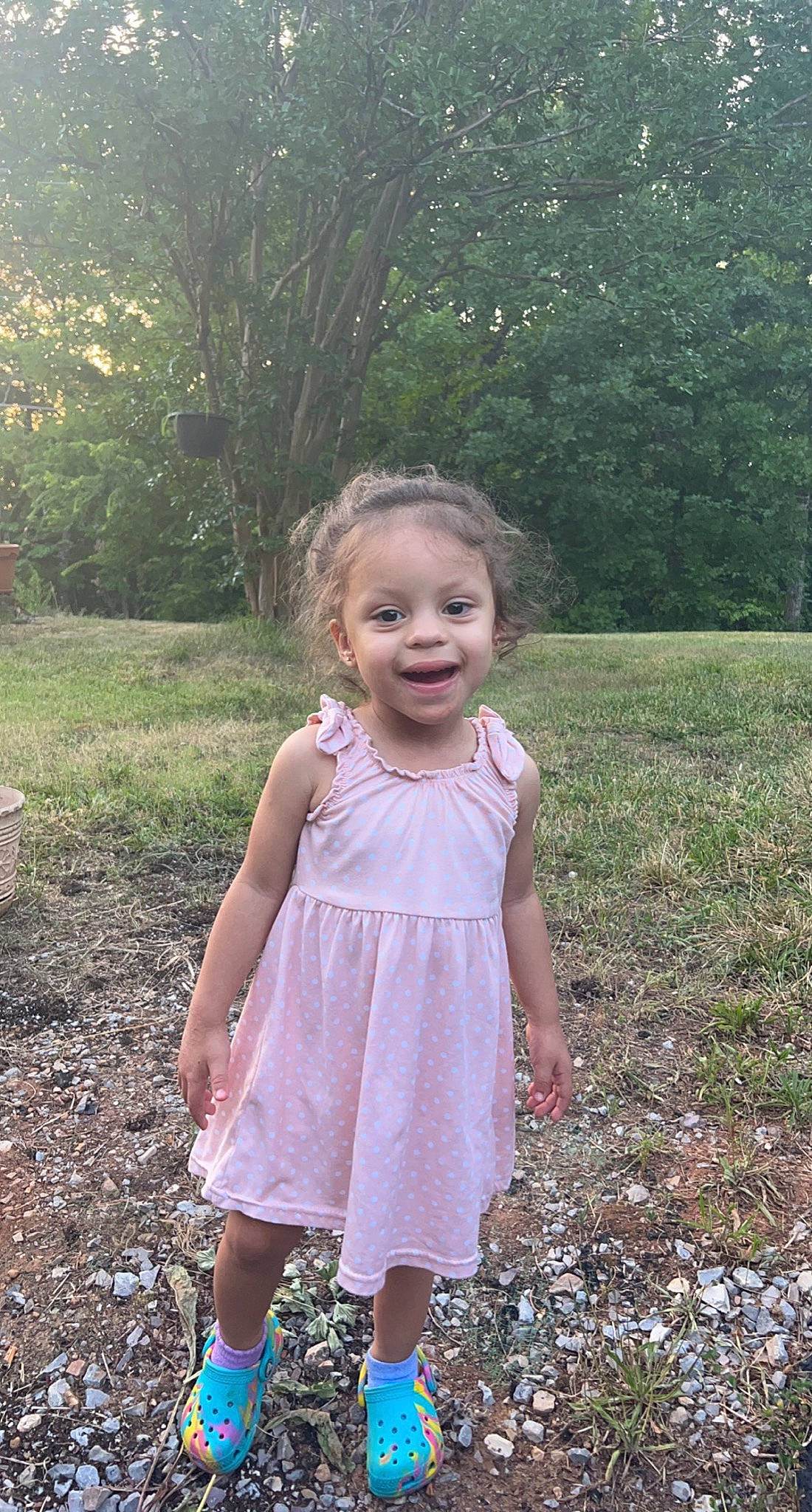 Heaven Lee'Grace Julian is registered to the contest to win money with this photo: baby_toddler_clothing, botany, day_dress, dress, eye, face, grass, hair, happy, joy, leaf, leg, nature, one_piece_garment, people_in_nature, person, pink, plant, shoulder, smile