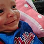 Andrew joined the competition — help win amazing prizes! baby, blue_clothing, casual, child, closeup, comfort, cushion, face, happy, household_items, indoor, person, philadelphia_phillies_logo, pink_color, polka_dot, portrait, resting, smiling, table, young_child