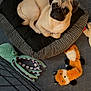 Daisy joined the competition — help win amazing prizes! dog, pug, dog_bed, stuffed_toy, octopus_toy, fox_toy, pet, indoor, quilted_surface, black, gray, beige, cute, curled_up, resting, fence, animal, pet_toys, carpet, cozy