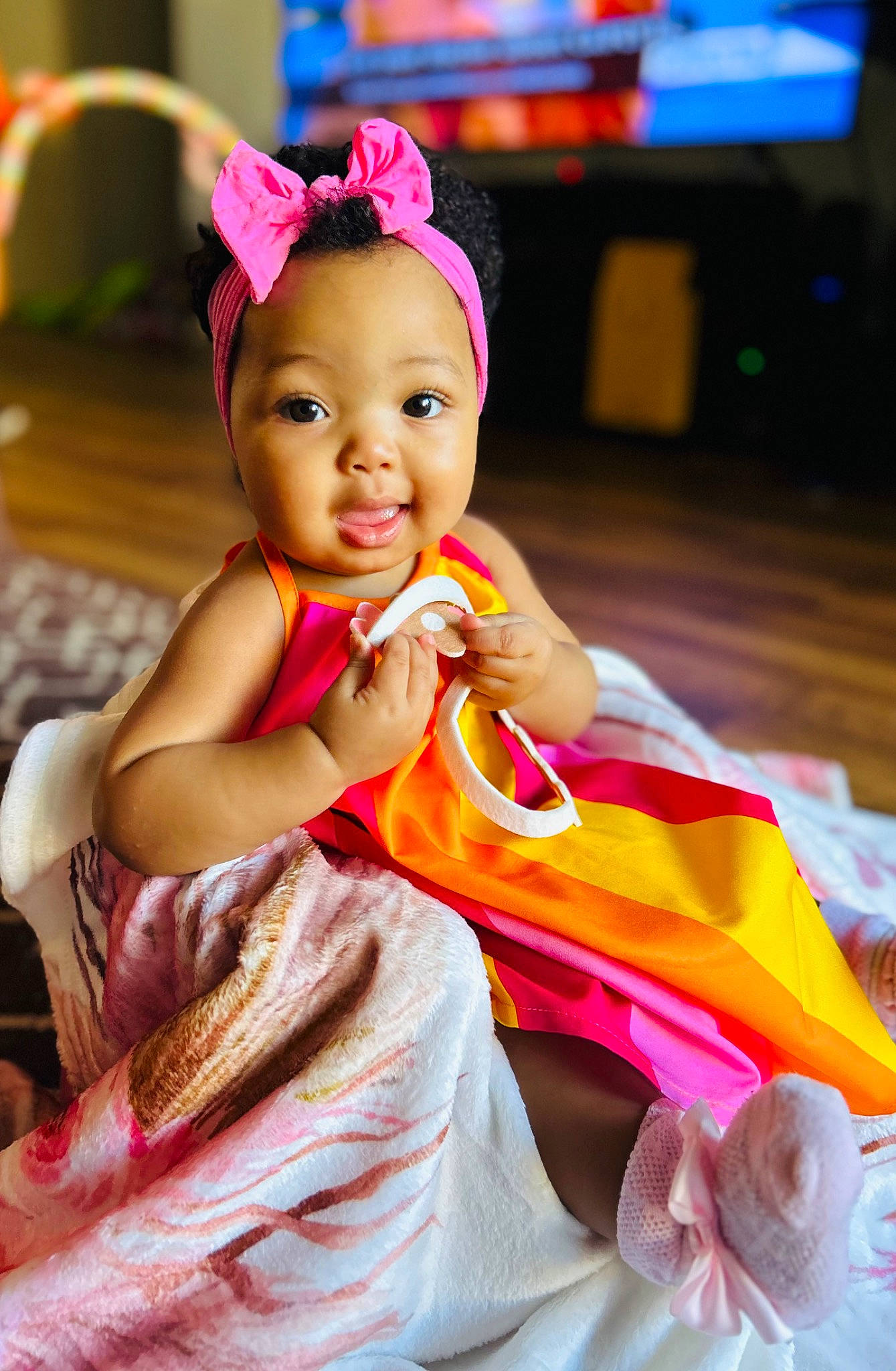 Zenovia is registered to the contest to win money with this photo: baby, baby_toddler_clothing, child, event, eyelash, fashion_accessory, flash_photography, fun, happy, headband, headpiece, jewellery, magenta, peach, person, pink, sitting, skin, smile, snapshot