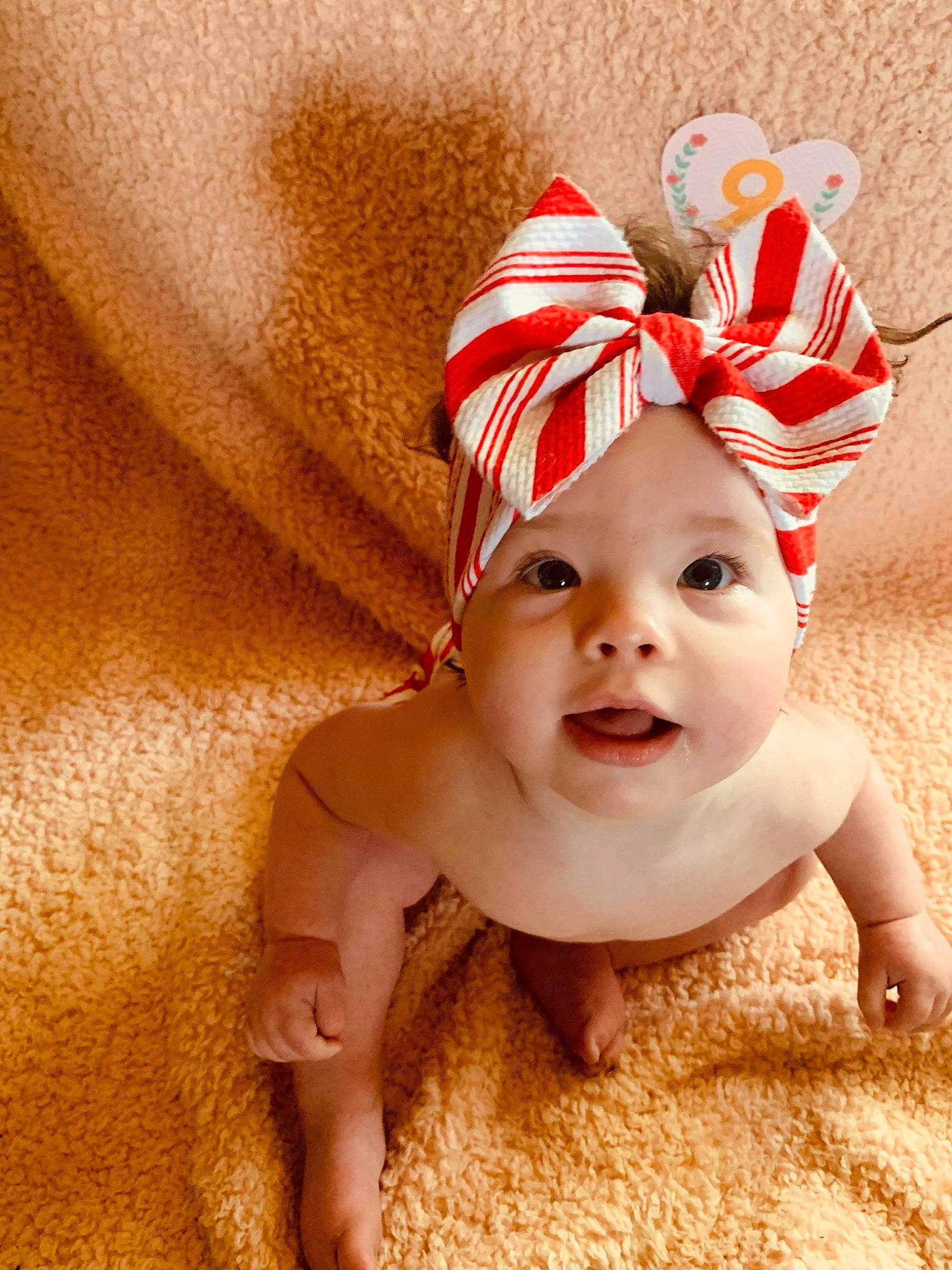 Davina joined the competition — help win amazing prizes! baby, baby_toddler_clothing, cap, carmine, child, costume_hat, face, fashion_accessory, fawn, fictional_character, flooring, hair_accessory, happy, head, headband, headpiece, headwear, human_body, person, skin