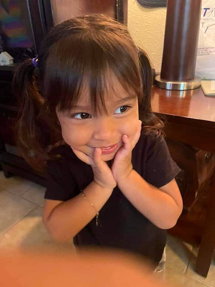 Maliah is registered to the contest to win money with this photo: bangs, black_hair, brown_hair, chair, cheek, child, electronic_device, eyebrow, eyelash, fun, happy, iris, joy, kitchen_appliance, layered_hair, long_hair, nose, person, smile, thumb