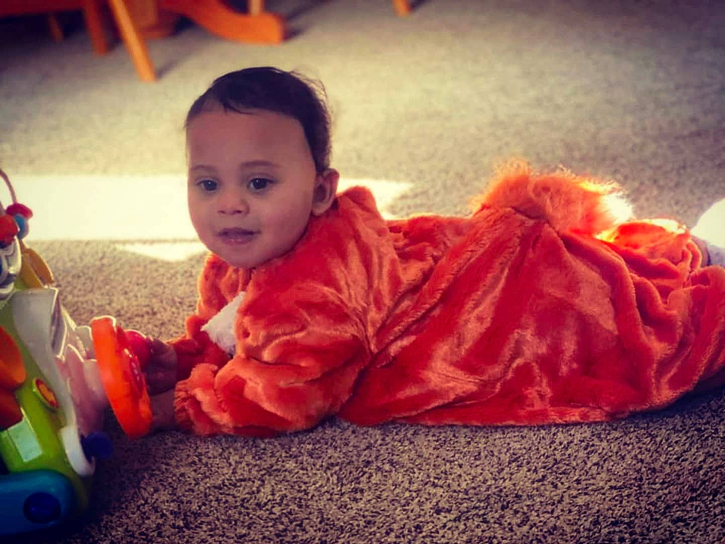 Leon joined the competition — help win amazing prizes! baby, cheek, child, fun, happy, head, orange, person, play, sitting, smile, toddler