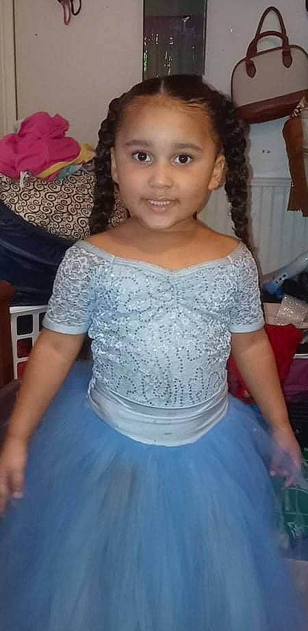 Ariah is registered to the contest to win money with this photo: black, dress, eye, face, facial_expression, fashion, hair, hairstyle, happy, head, human_body, iris, joint, joy, neck, organ, person, shoulder, smile, standing