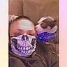 Peewee is registered to the contest to win money with this photo: person, cat, selfie, face_filter, skull_filter, blue_bandana, pet, animal, indoors, couch, portrait, closeup, kissing, affection, cute, funny, pastel_background, rainbow_border, love_text, smartphone_photo