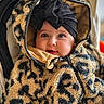 Paola a rejoint le concours — aidez-le/la à gagner de superbes lots ! baby, bow, cheeks, child, closeup, eyes, face, hat, hood, infant, jacket, leopard_print, long_eyelashes, pattern, portrait, smile, stroller, teddy_fabric, warm_clothing, zipper
