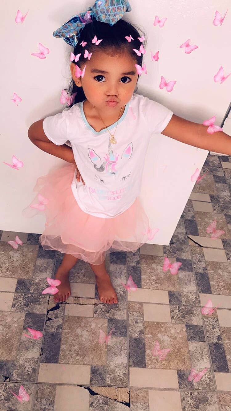 Miracle is registered to the contest to win money with this photo: baby, baby_toddler_clothing, child, child_model, clothing, costume, hair_accessory, headband, headgear, headpiece, person, pink, play, skin, sleeve, toddler