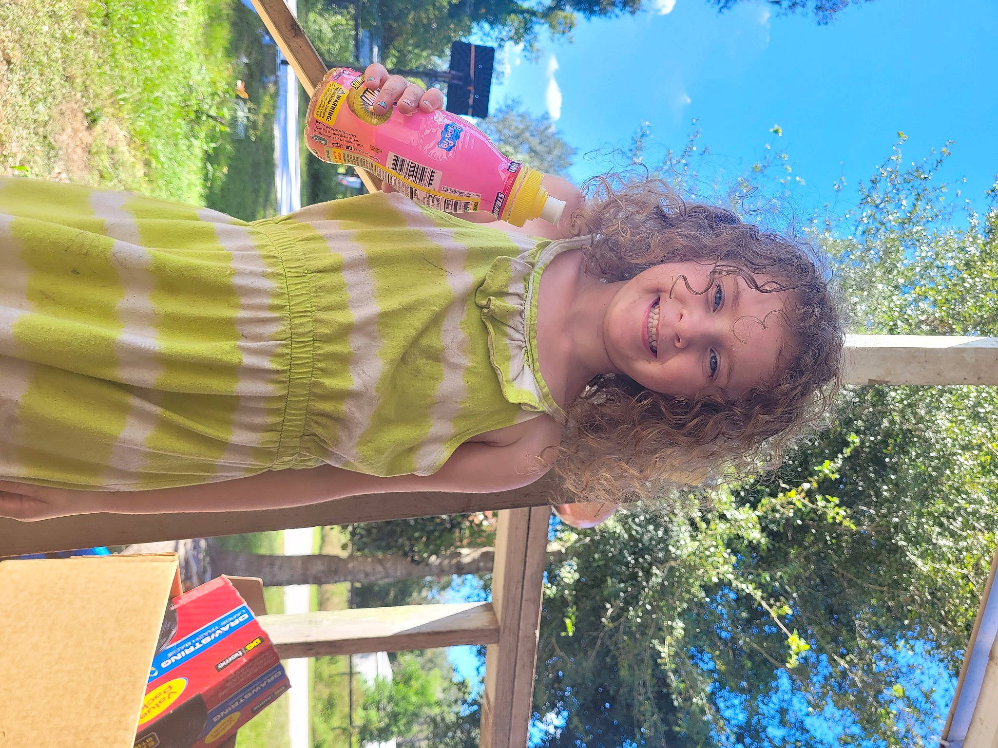 Raelynn is registered to the contest to win money with this photo: adaptation, botany, child, electric_blue, fun, grass, happy, joy, leaf, leisure, magenta, nature, people_in_nature, person, plant, public_space, sky, spring, t_shirt, tree