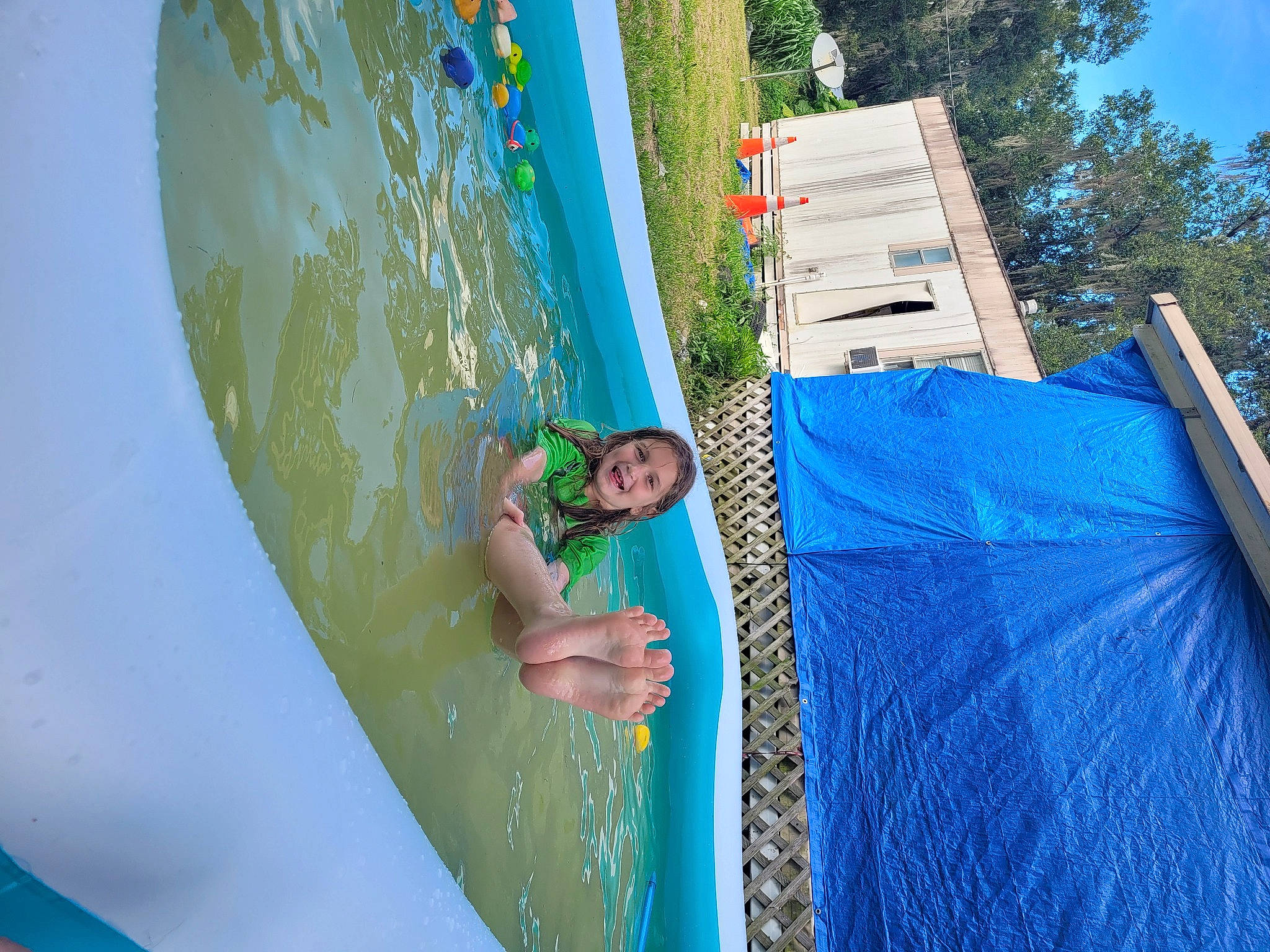 Dixie joined the competition — help win amazing prizes! azure, blue, electric_blue, fun, games, grass, happy, inflatable, joy, leisure, outdoor_recreation, people_in_nature, person, plant, recreation, sky, smile, sunglasses, t_shirt, tree