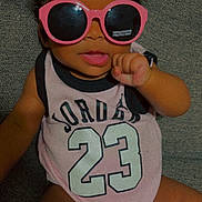 Alyssa Jacobs joined the competition — help win amazing prizes! accessories, baby, bodypart, clothing, couch, face, finger, furniture, glasses, goggles, hand, head, person, photography, portrait, selfie, shorts, sitting, sunglasses, t_shirt