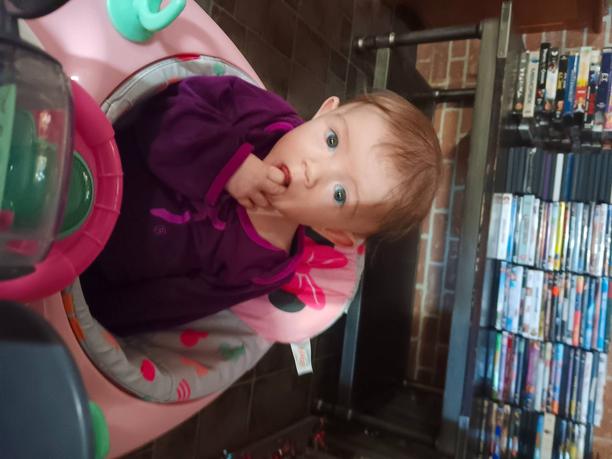 Nicole joined the competition — help win amazing prizes! baby, baby_products, baby_toddler_clothing, bookcase, cheek, child, drawer, fun, magenta, mammal, person, publication, retail, room, shelf, shelving, sitting, surprise, toddler, tree