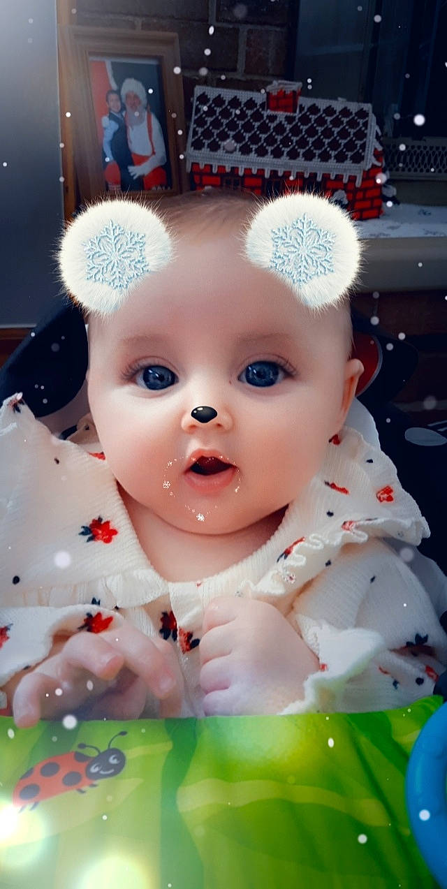 Scarlet joined the competition — help win amazing prizes! baby, baby_products, baby_toddler_clothing, blurred, cheek, child, eyelash, fashion_accessory, fun, grass, hair_accessory, happy, headband, headpiece, iris, lip, pattern, person, petal, pink