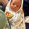 Raelynn is registered to the contest to win money with this photo: newborn, baby, blanket, winnie_the_pooh, wrapped, infant, face, tattoo, arm, soft, cozy, cute, portrait, indoors, person, expression, fabric, plush, resting, closeup