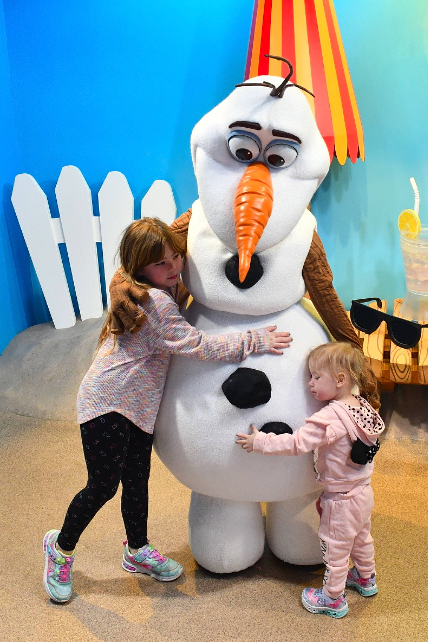 Olivia is registered to the contest to win money with this photo: animation, boot, child, costume, event, footwear, fun, fur, games, gesture, happy, hat, leisure, mascot, party_supply, person, recreation, t_shirt, toddler, tourism