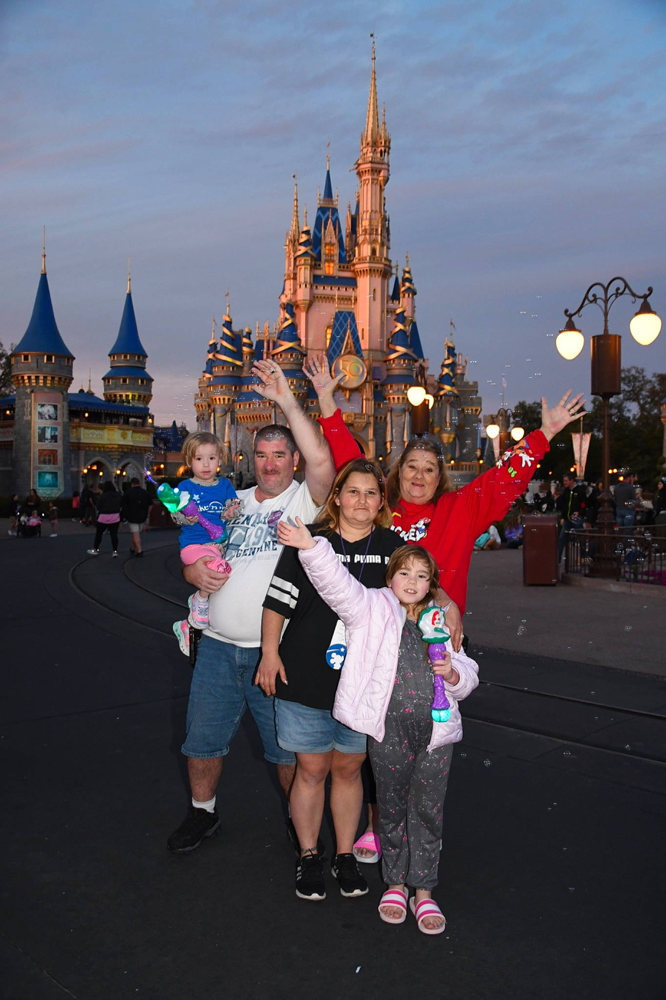 Jocelyn is registered to the contest to win money with this photo: building, city, cloud, crowd, event, fun, happy, joy, leisure, pedestrian, person, pink, recreation, shorts, sky, smile, spire, tourism, travel, turret
