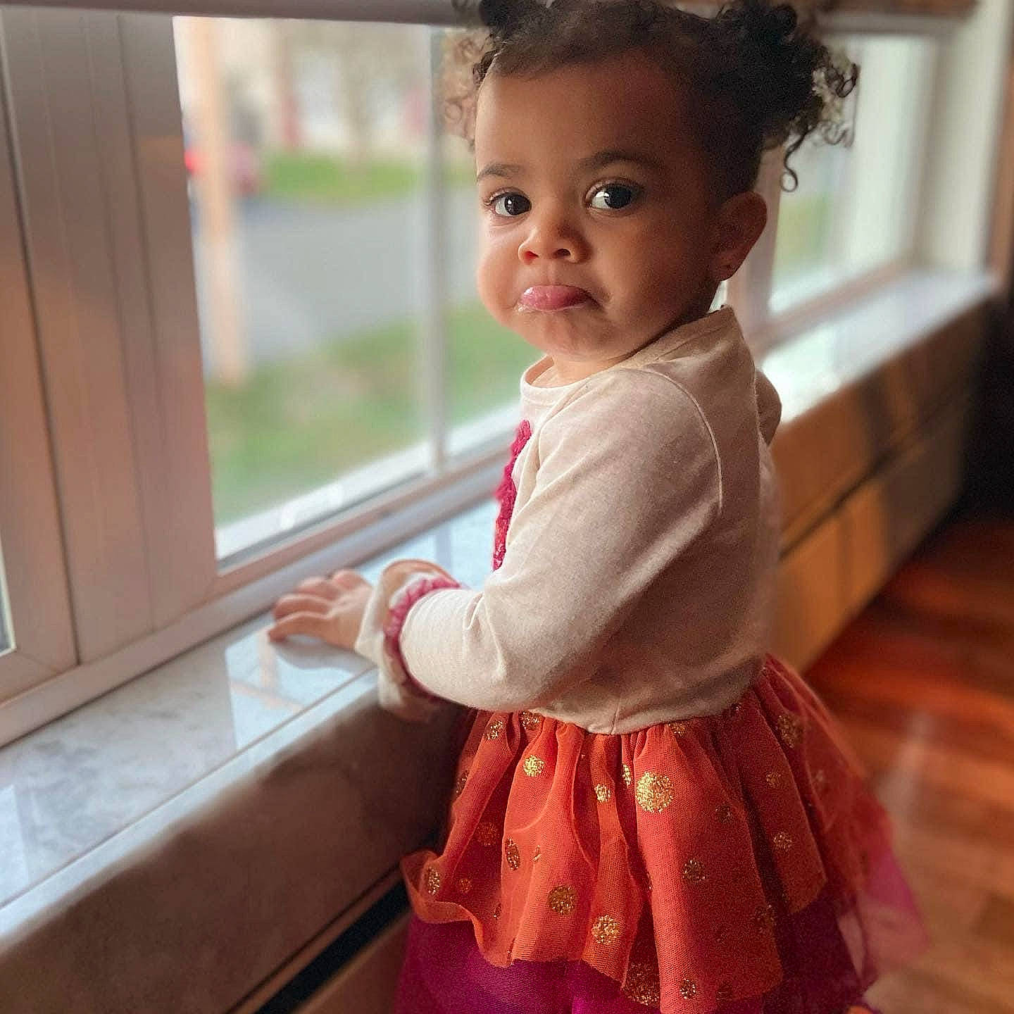 Layla joined the competition — help win amazing prizes! baby_toddler_clothing, cheek, day_dress, flooring, fun, hair, happy, iris, joint, lip, neck, person, pink, shoulder, skin, sleeve, smile, toddler, waist, window