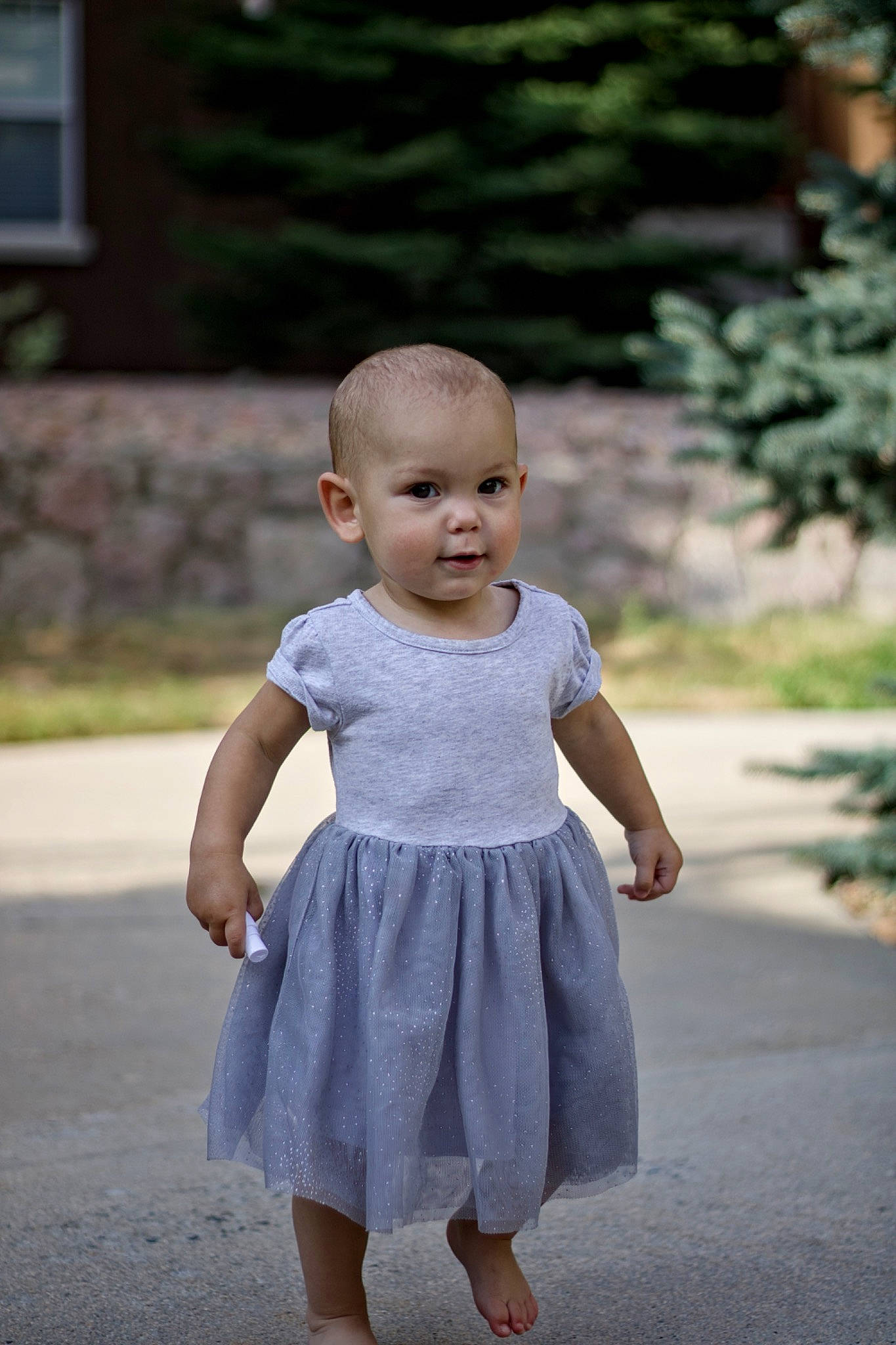 Averie joined the competition — help win amazing prizes! asphalt, baby, baby_toddler_clothing, child, clothing, day_dress, dress, event, gesture, grass, happy, human_body, one_piece_garment, person, plant, sleeve, toddler, tree, waist, walking