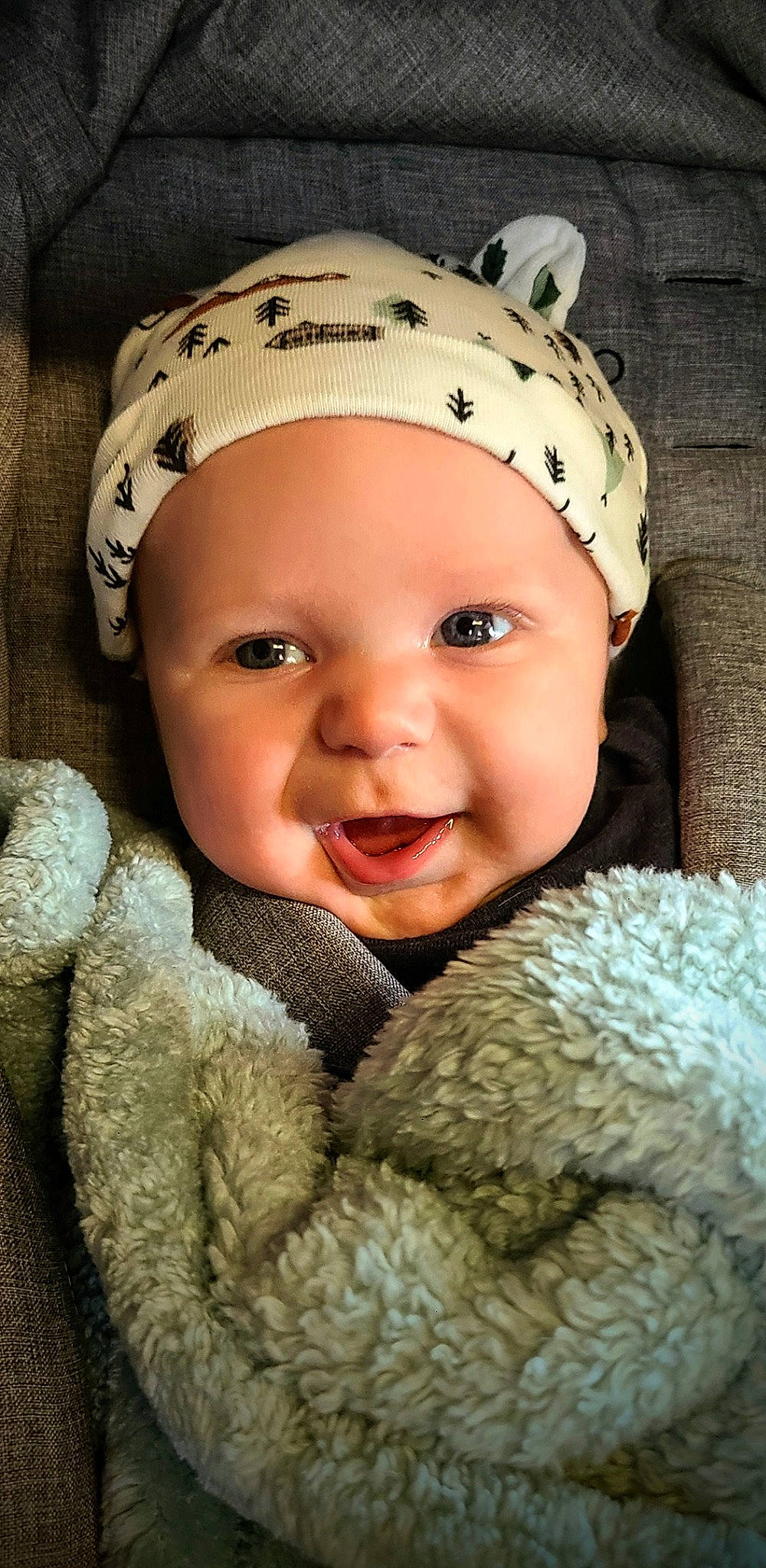 Karson is registered to the contest to win money with this photo: baby, baby_laughing, baby_toddler_clothing, beanie, cap, cheek, child, close_up, eye, flash_photography, fur, happy, headgear, headwear, knit_cap, nose, person, photograph, skin, smile