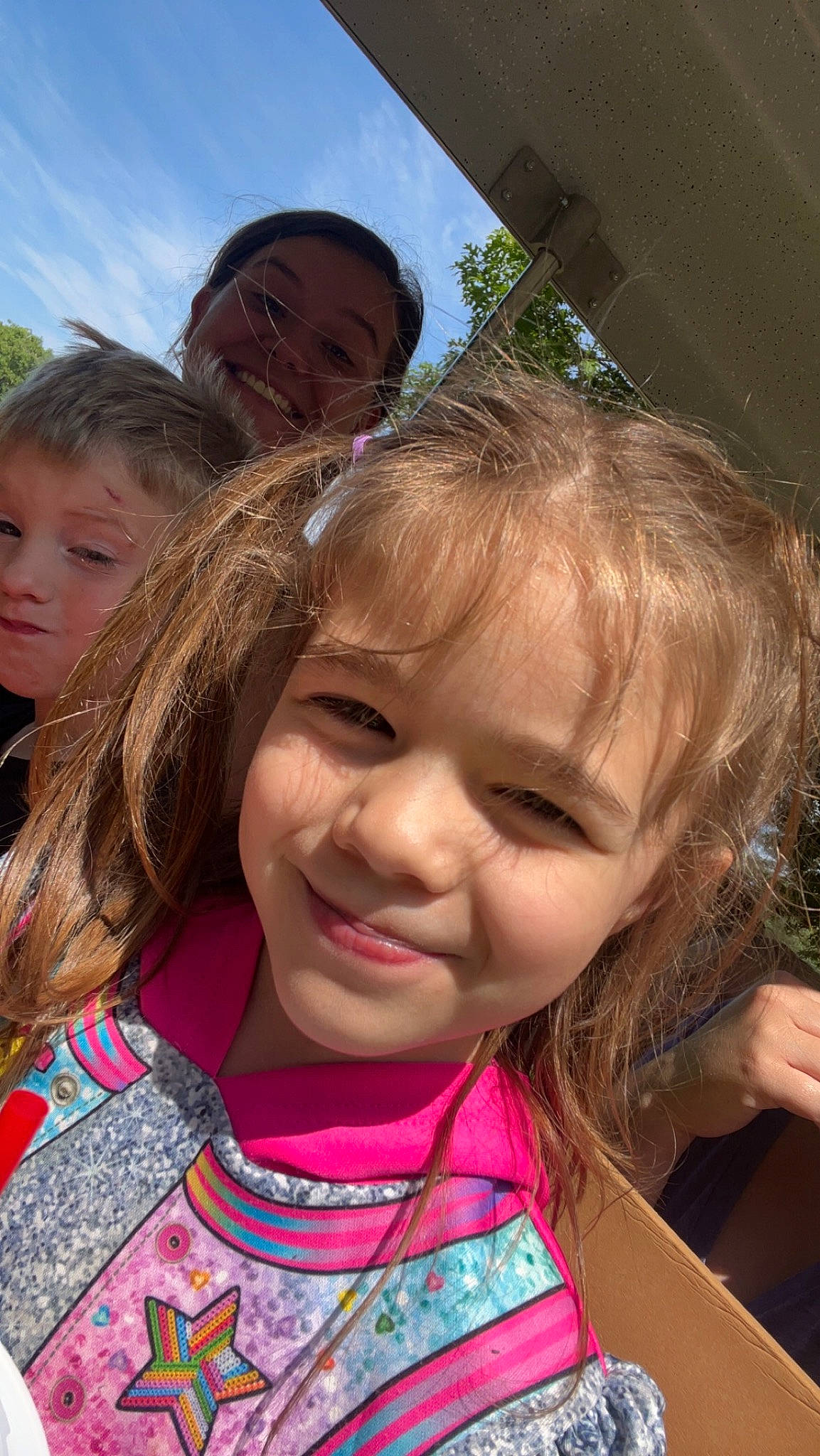 Rosaetta is registered to the contest to win money with this photo: cheek, child, chin, cloud, event, eye, fun, grass, happy, head, iris, joy, leisure, lip, nose, people_in_nature, person, recreation, skin, sky