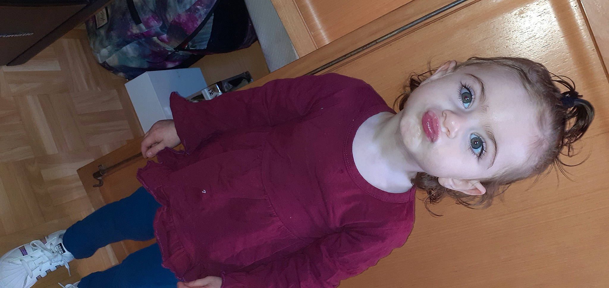 Ilona participe au concours pour gagner de l'argent avec cette photo : baby_toddler_clothing, cheek, chest, child, ear, eyelash, fun, fur, lip, magenta, mouth, nose, person, pink, purple, room, skin, sleeve, toddler, wig