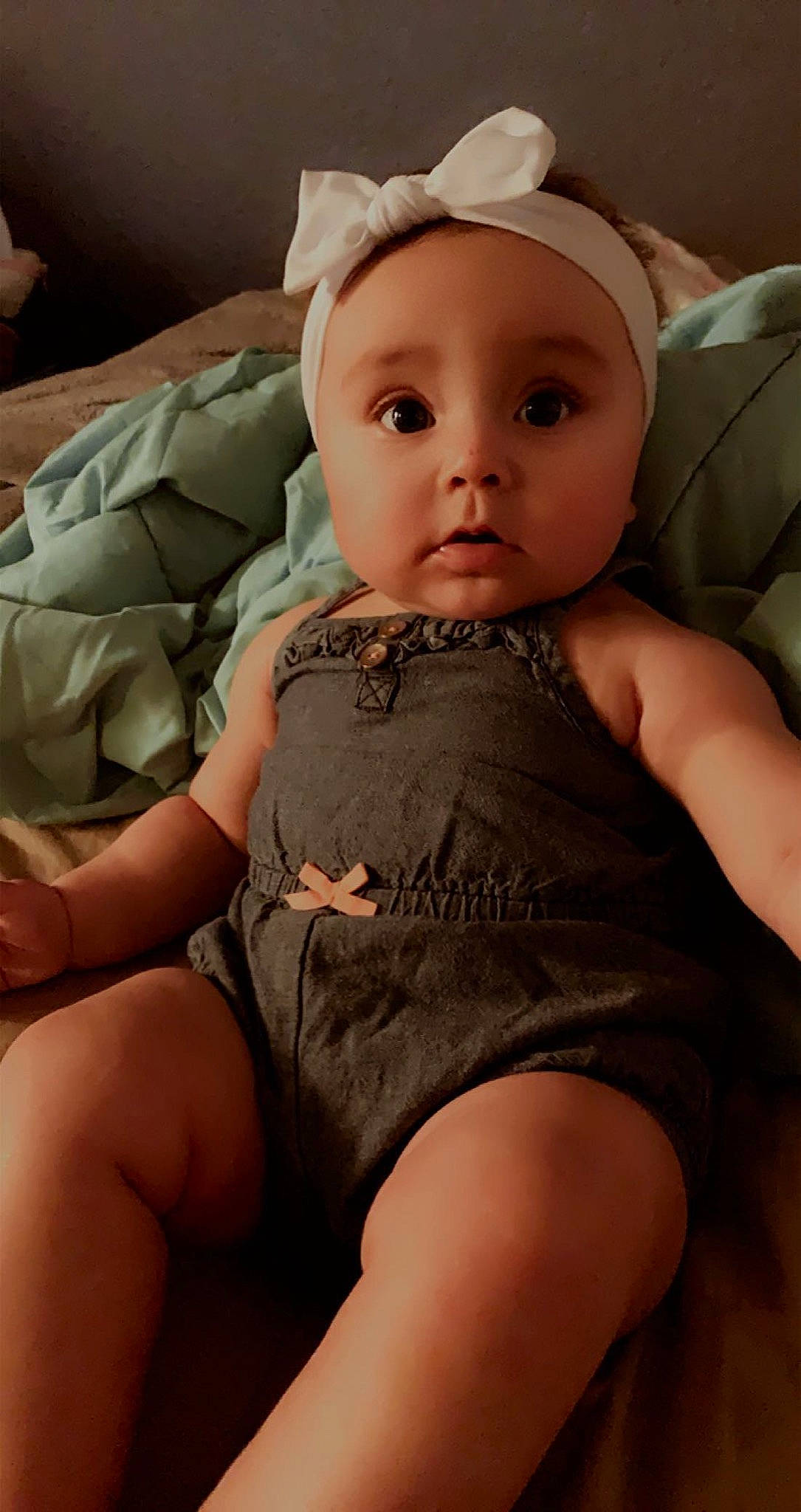 Juliana is registered to the contest to win money with this photo: baby, baby_toddler_clothing, cheek, chin, comfort, eye, eyelash, face, finger, hairstyle, human_body, knee, lip, mouth, muscle, neck, person, skin, stomach, surprise