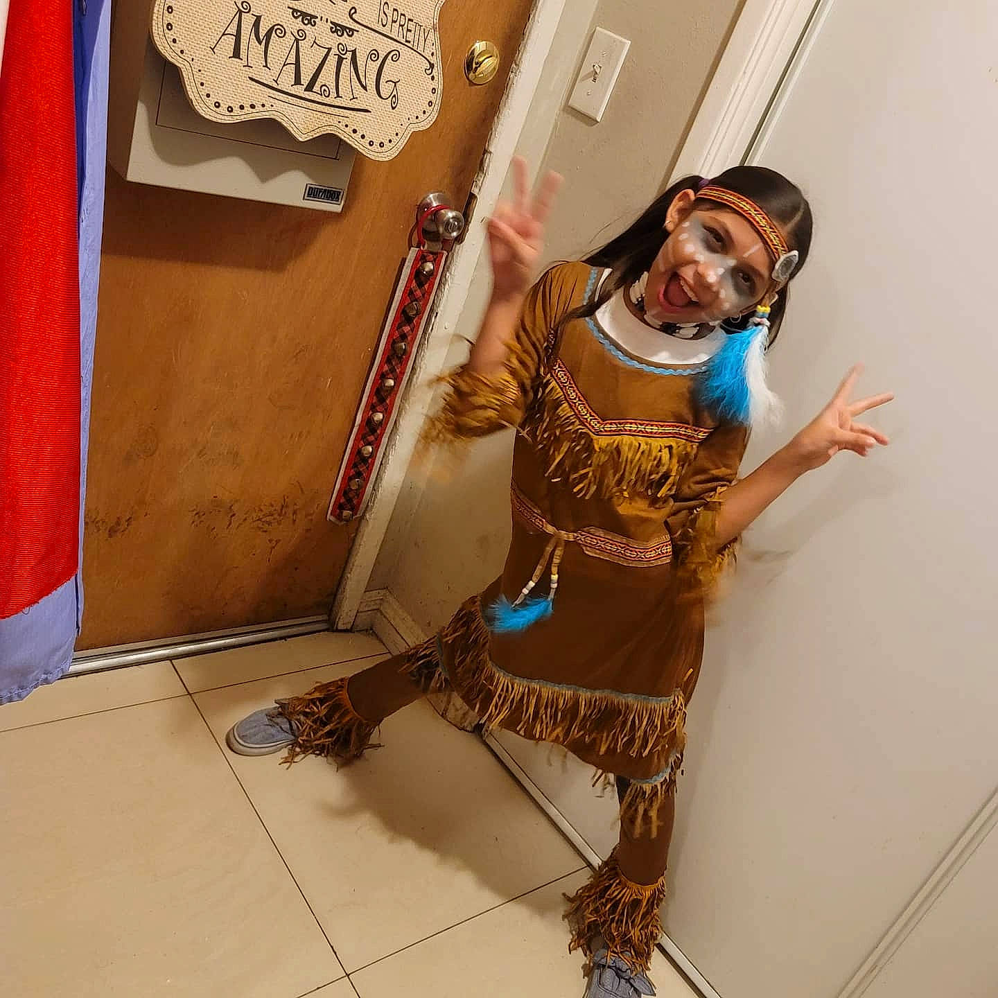 Marisol joined the competition — help win amazing prizes! chair, elbow, eyewear, fashion_design, flooring, fun, happy, headwear, human_body, human_leg, joy, knee, person, personal_protective_equipment, room, shoulder, sleeve, smile, t_shirt, thigh