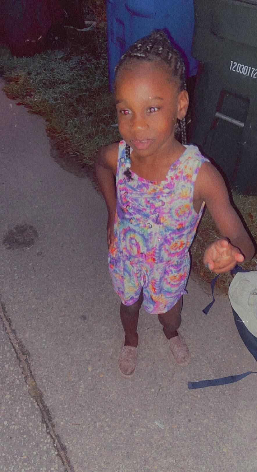 Kehlani is registered to the contest to win money with this photo: arm, child, dress, eye, face, flip_flops, foot, fun, happy, human_leg, jewellery, joy, leg, lip, magenta, person, sandal, sitting, skin, soil