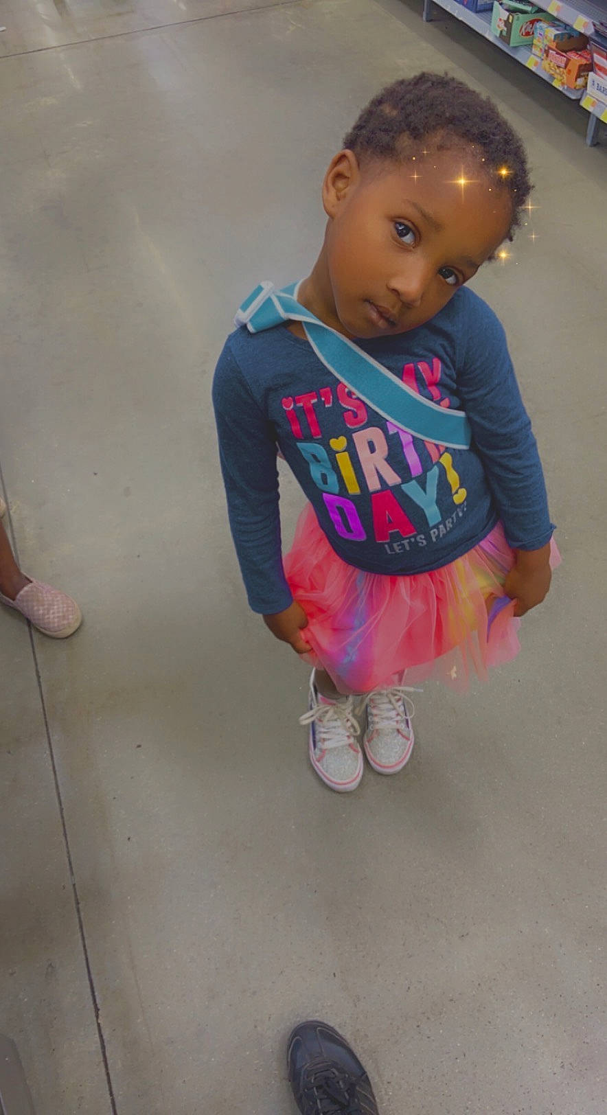 Kehmani joined the competition — help win amazing prizes! baby_toddler_clothing, child, cool, face, fashion_design, flooring, foot, fun, happy, head, human_leg, magenta, pattern, person, sandal, shoe, sleeve, sneakers, sportswear, t_shirt