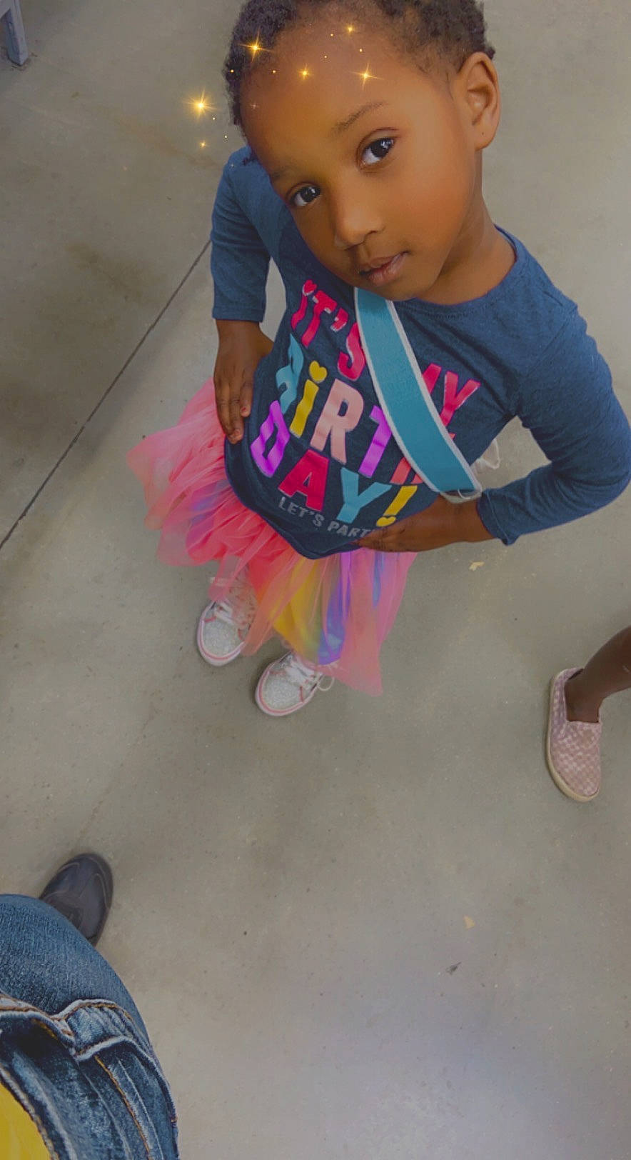 Kehmani is registered to the contest to win money with this photo: baby, baby_toddler_clothing, child, floor, flooring, foot, fun, human_leg, magenta, nail, pattern, person, pink, play, sandal, sitting, sleeve, t_shirt, thigh, toddler