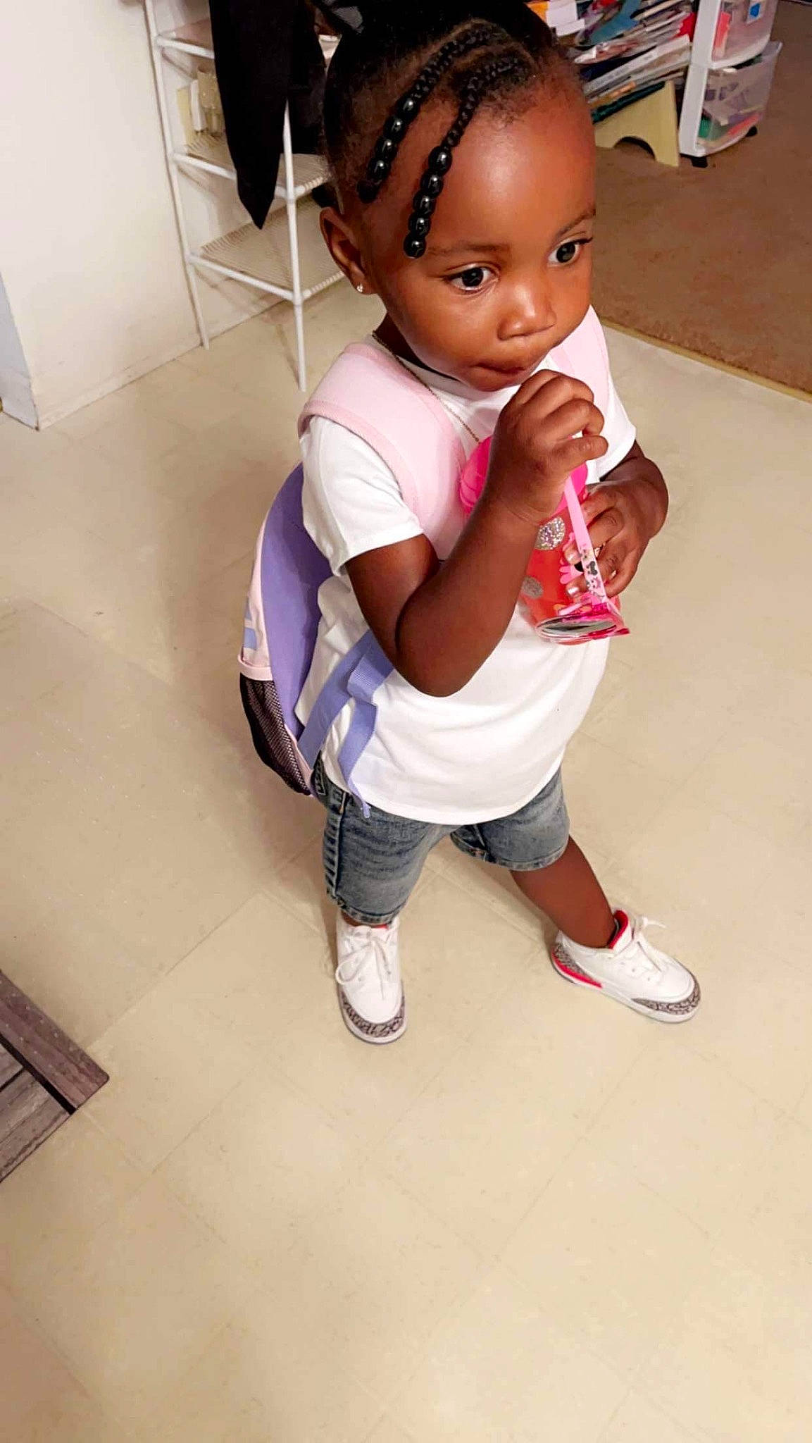 Amayah is registered to the contest to win money with this photo: baby, baby_toddler_clothing, child, doll, eyelash, fashion_accessory, fashion_design, flooring, human_leg, knee, leg, person, shorts, sleeve, sneakers, t_shirt, thigh, toddler, toy, trunk