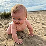 baby, child, sand, beach, crawling, bare_chest, smile, blue_eyes, cloudy_sky, grass, nature, outdoor, cute, infant, skin, portrait, expression, playful, happy, young