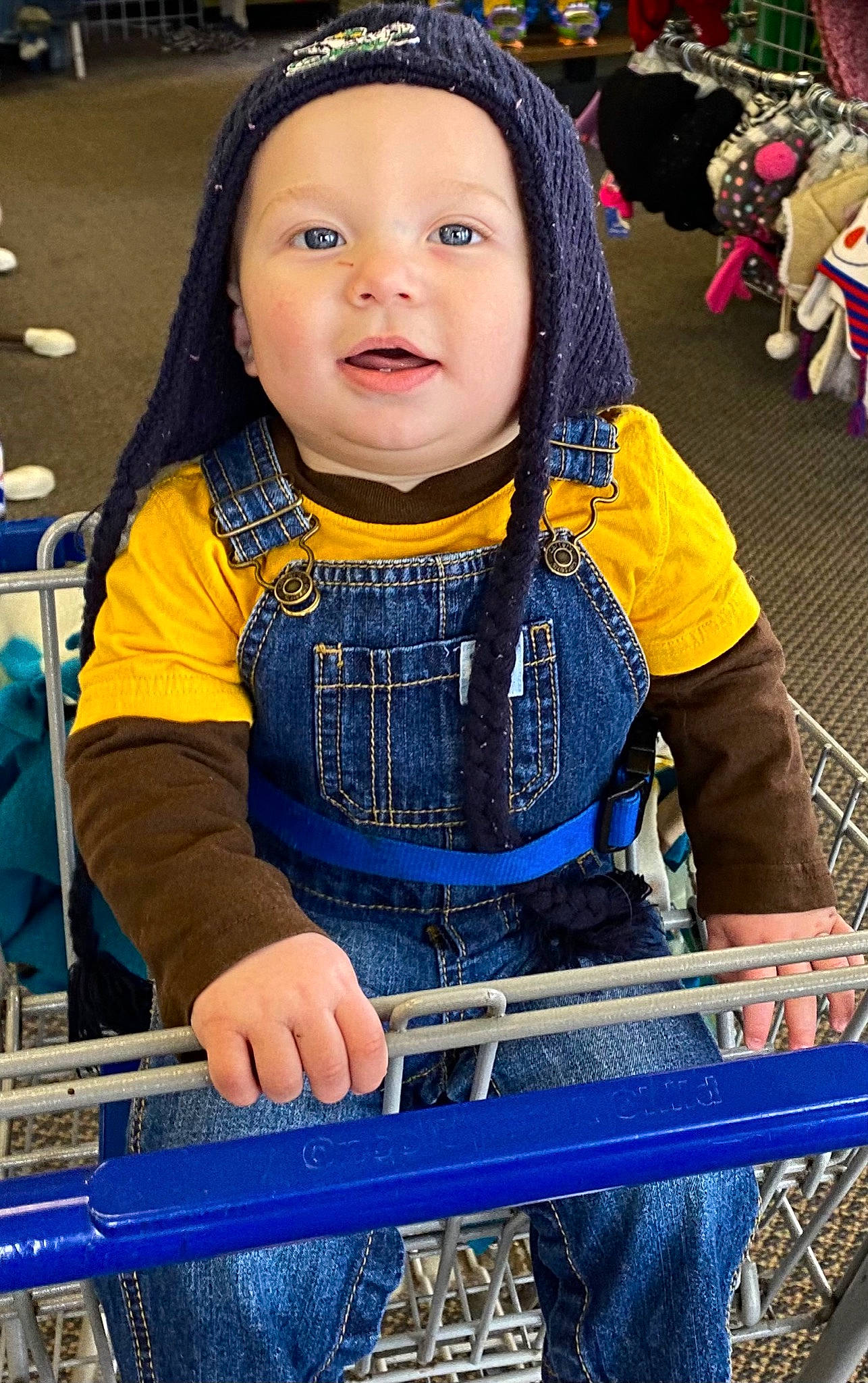 Johnathan is registered to the contest to win money with this photo: baby, baby_carriage, baby_toddler_clothing, blue, child, city, electric_blue, eye, fun, happy, headwear, leisure, market, person, recreation, retail, shopping, shopping_cart, smile, snapshot