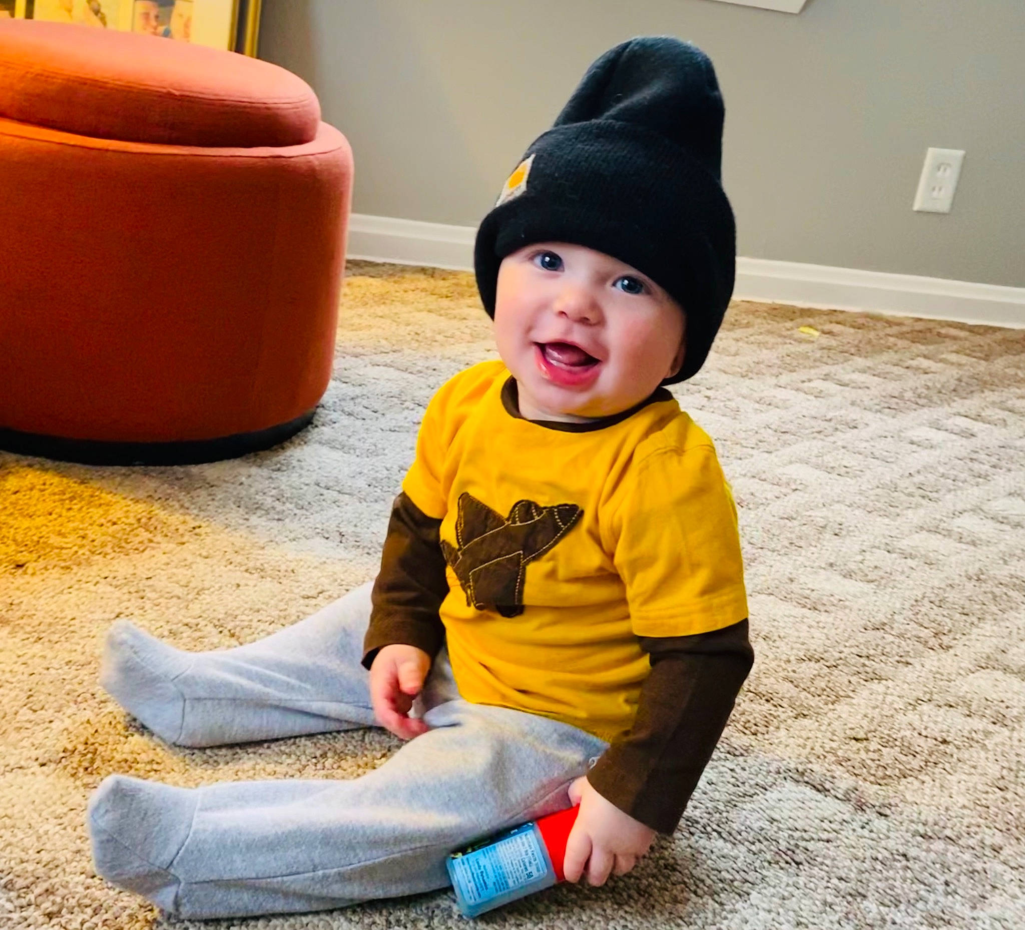Johnathan joined the competition — help win amazing prizes! baby, baby_toddler_clothing, cap, child, comfort, costume_hat, face, floor, flooring, happy, hat, headwear, human_body, outerwear, person, shorts, sleeve, smile, standing, textile
