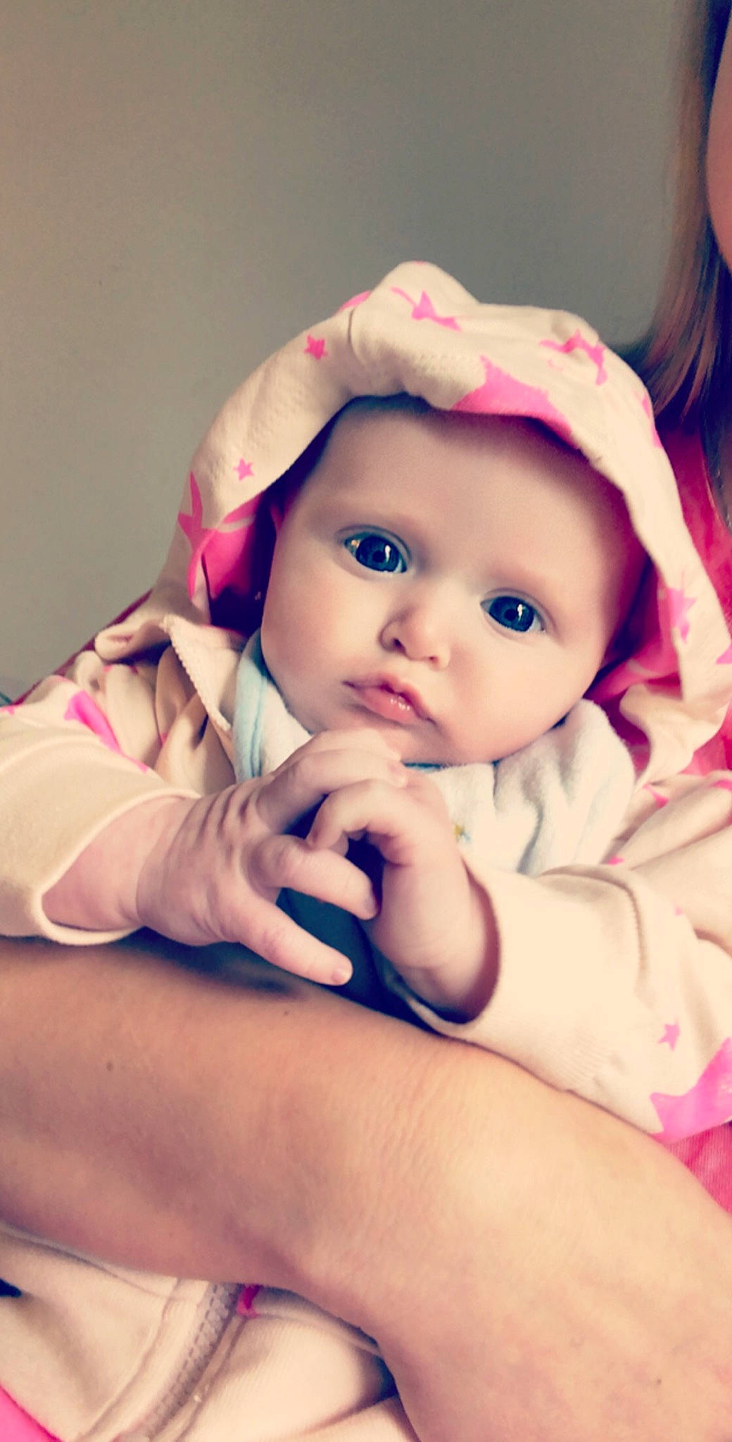 Alaina is registered to the contest to win money with this photo: baby, beauty, cheek, child, child_model, eye, face, hair_accessory, hand, head, headgear, lip, nose, person, photography, pink, play, portrait_photography, skin, toddler