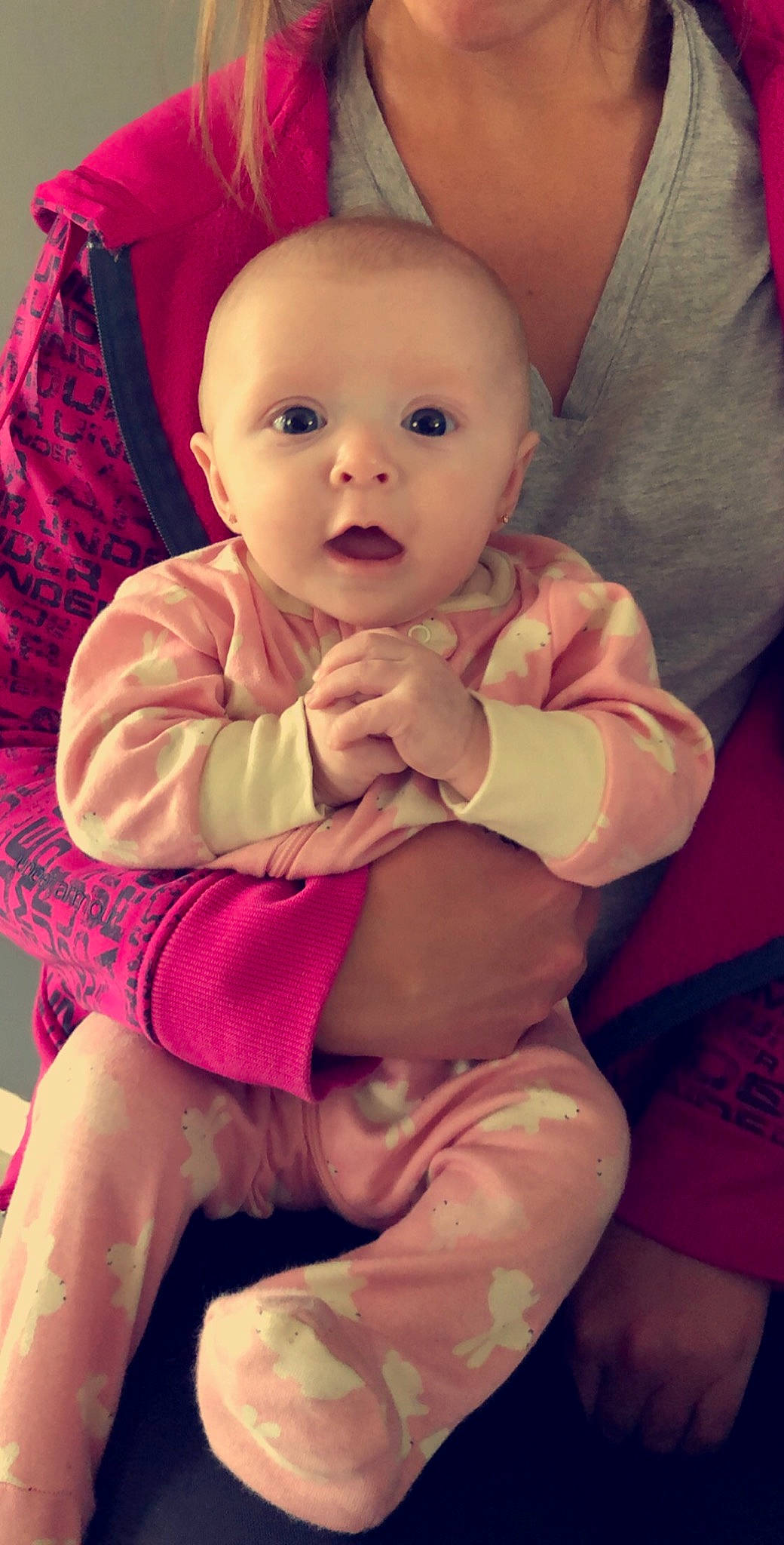 Alaina joined the competition — help win amazing prizes! baby, cheek, child, chin, eye, face, finger, hand, head, iris, leg, lip, mouth, nose, person, pink, sitting, skin, smile, surprise