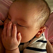 Hayes joined the competition — help win amazing prizes! baby, blanket, child, closeup, clothing, cute, ear, face, hand, infant, nap, newborn, peaceful, portrait, resting, skin, sleeping, soft, striped, toddler