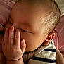baby, blanket, child, closeup, clothing, cute, ear, face, hand, infant, nap, newborn, peaceful, portrait, resting, skin, sleeping, soft, striped, toddler