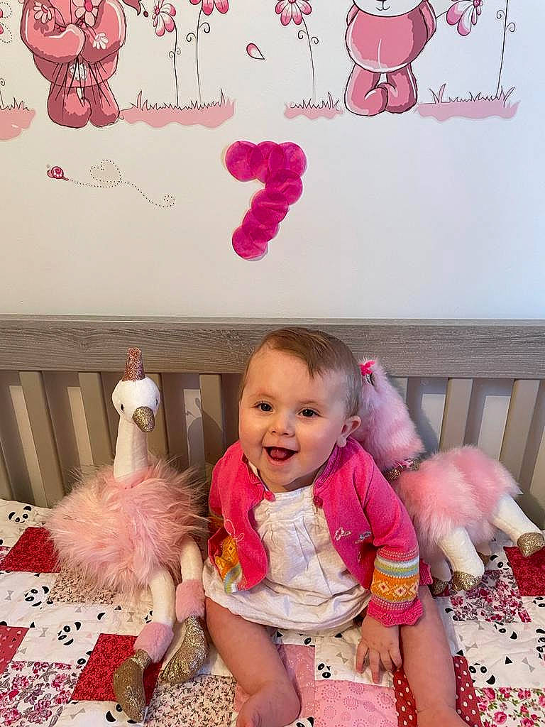 Romane a rejoint le concours — aidez-le/la à gagner de superbes lots ! art, baby_toddler_clothing, child, design, dress, event, happy, magenta, mammal, organ, person, picture_frame, pink, product, red, room, smile, snapshot, textile, toddler