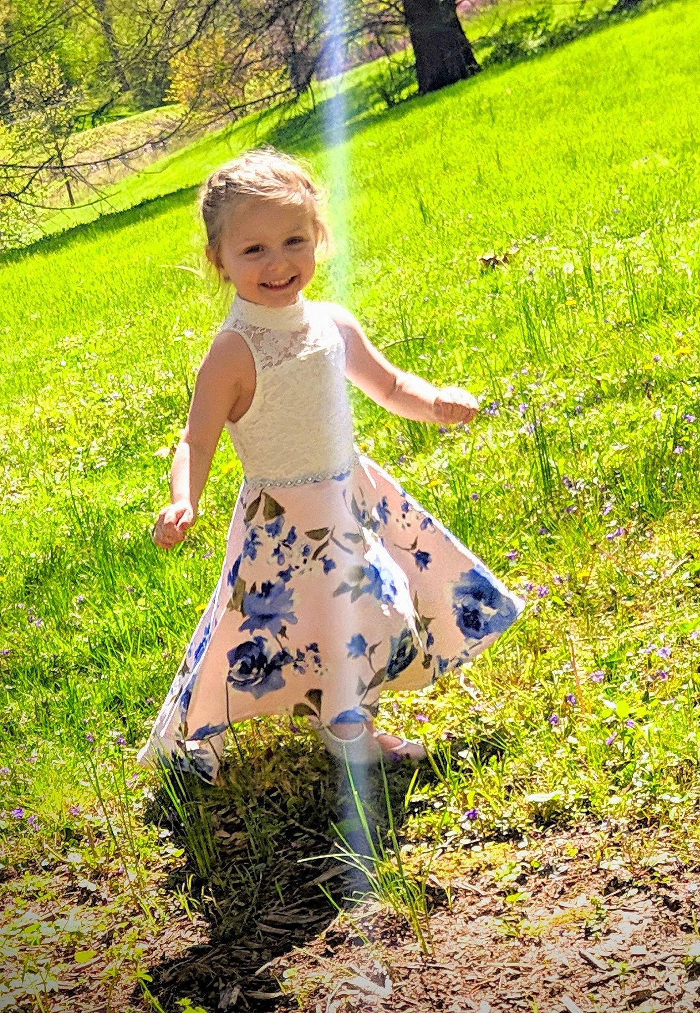 Gwendolyn is registered to the contest to win money with this photo: blond, child, design, dress, grass, grass_family, green, joy, leaf, meadow, pattern, people_in_nature, person, photography, plant, spring, summer, toddler, tree, wildflower