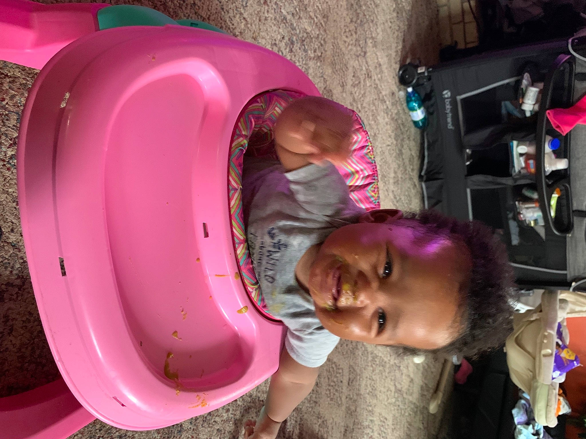 Davion is registered to the contest to win money with this photo: automotive_tire, automotive_wheel_system, child, circle, city, fender, fun, hairstyle, leisure, machine, magenta, person, photograph, photography, pink, play, purple, smile, synthetic_rubber, toddler