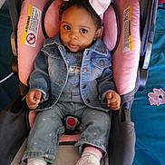 Zae'Lani joined the competition — help win amazing prizes! baby, car, car_interior, carseat, clothing, coat, couch, face, footwear, furniture, hat, head, jacket, jeans, pants, person, shoe, stroller, transportation, vehicle
