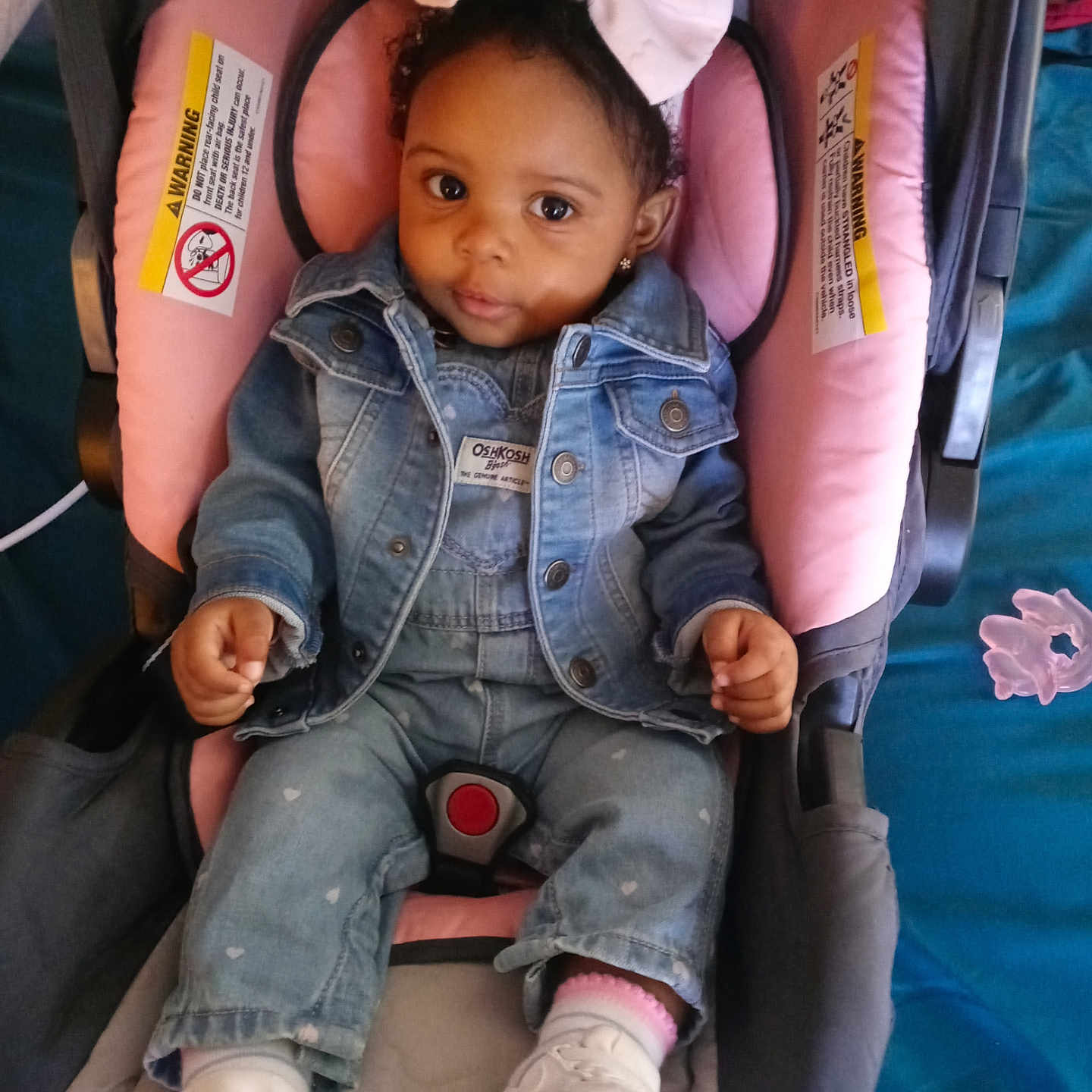 Zae'Lani joined the competition — help win amazing prizes! baby, car, car_interior, carseat, clothing, coat, couch, face, footwear, furniture, hat, head, jacket, jeans, pants, person, shoe, stroller, transportation, vehicle
